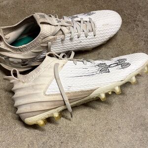 White and Tan Football Cleats